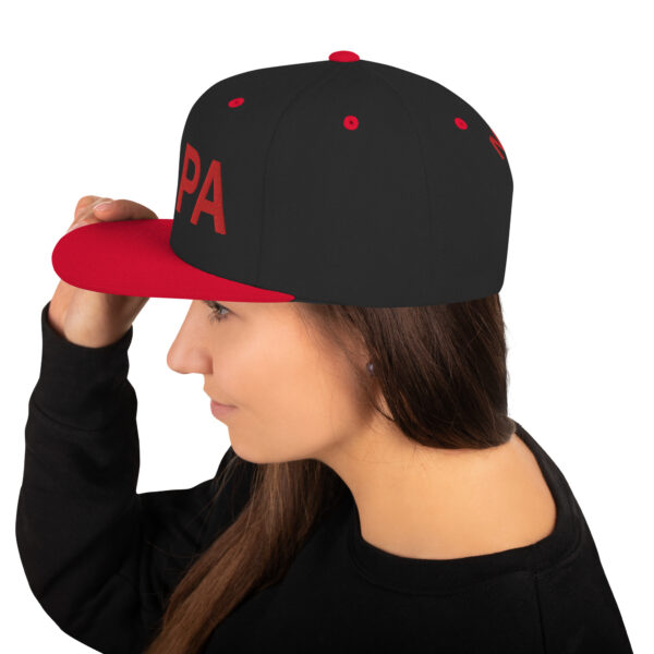 classic-snapback-black-red-left-side-64d8ff738c675.jpg